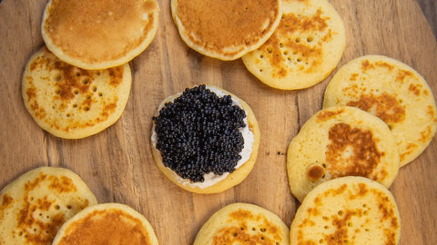 Caviar compliments including blinis and gourmet pairings available in Ontario, Canada from Caviar Centre