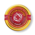 Sterlet caviar in a container with mother-of-pearl spoon on a serving board